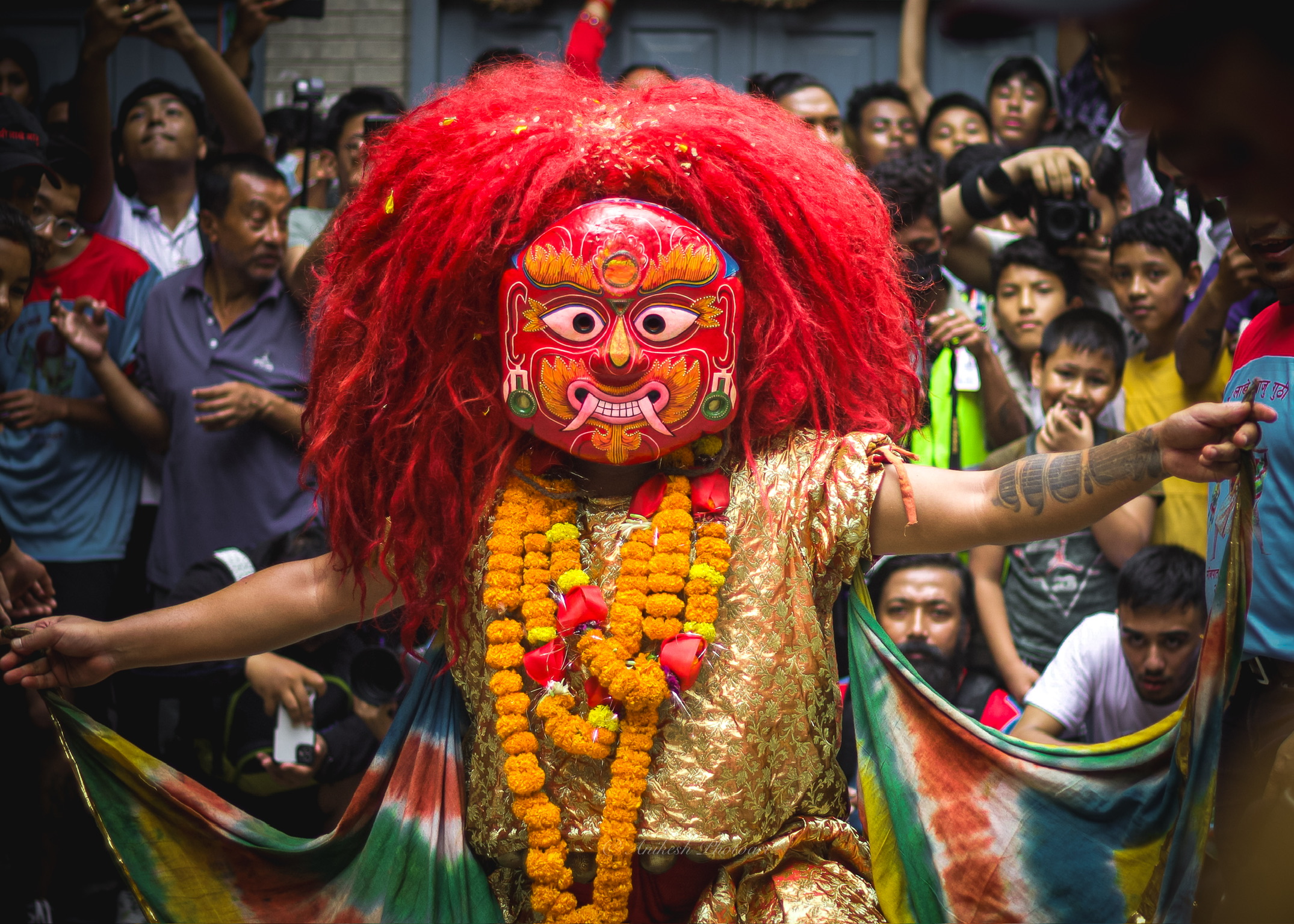 Majipa Lakhey dancing through the Indra Jatra crowd